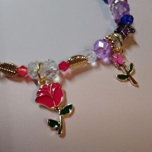 Stunning Rose Garden Bracelet with crystals and enamel charms
